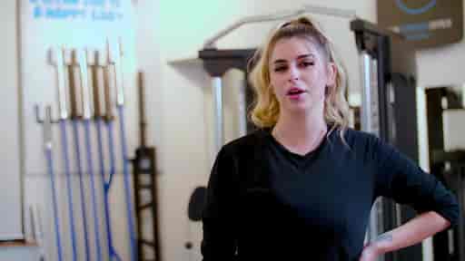 Reesa taking a short break in a private gym studio.
